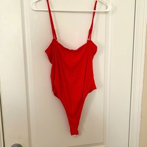 Red body suit